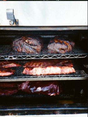 Ribs and brisket in the smoker